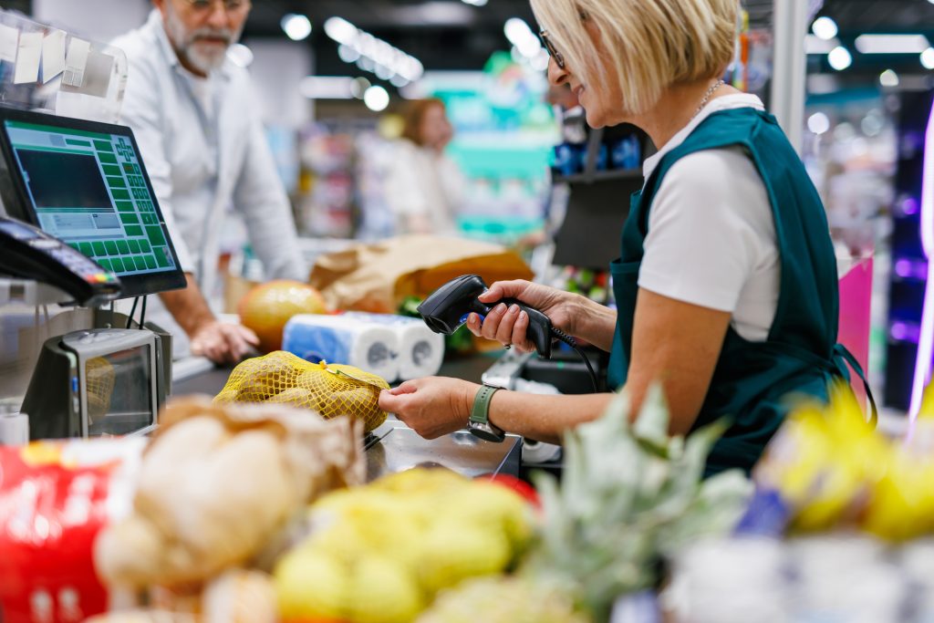 Cashier scanning product